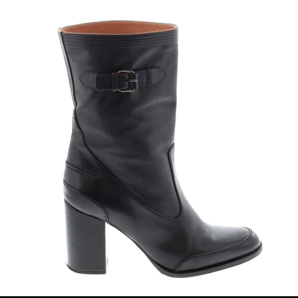 Black mid-calf boots by Veronique Branquinho.